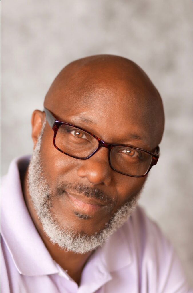 Freddie Streeter portrait with glasses and beard